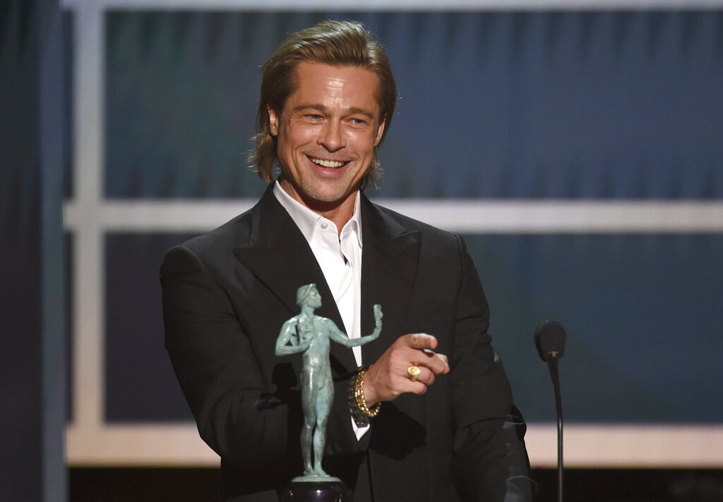 Brad Pitt accepts the award for outstanding performance by a male actor in a supporting role for "Once Upon a Time in Hollywood" at the 26th annual Screen Actors Guild Awards at the Shrine Auditorium & Expo Hall on Sunday, January 19, 2020, in Los Angeles