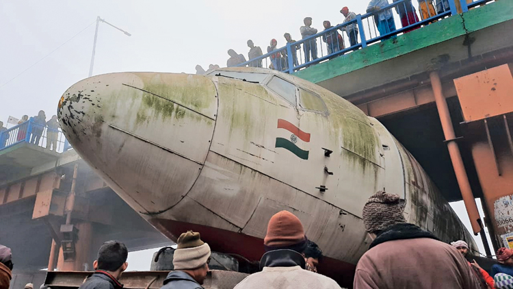 The aircraft stuck under the flyover in Durgapur early on Tuesday