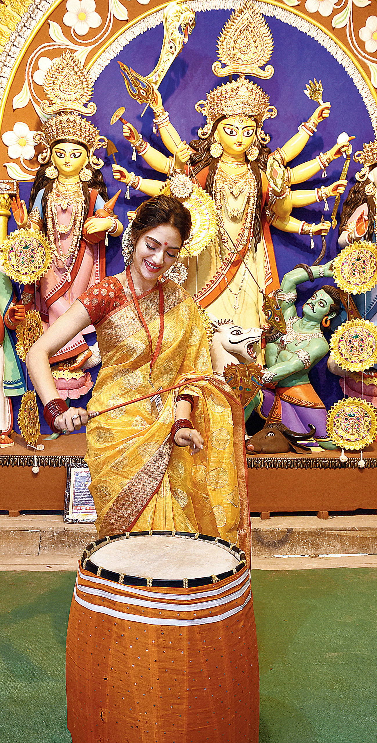 Nusrat Jahan tried her hand at playing a dhaak for the first time at the Olabibitola Sarbojanin puja in Howrah. “I have only played the guitar so far. Sync-e chhilo… besh moja legechhe… it was great fun. You should wake up to the beats of dhaak during Puja. That’s the blessed part about being a Calcuttan. We wait for it the whole year. It took me back to my childhood when I would actually wake up to the beats of dhaak,” she smiled
