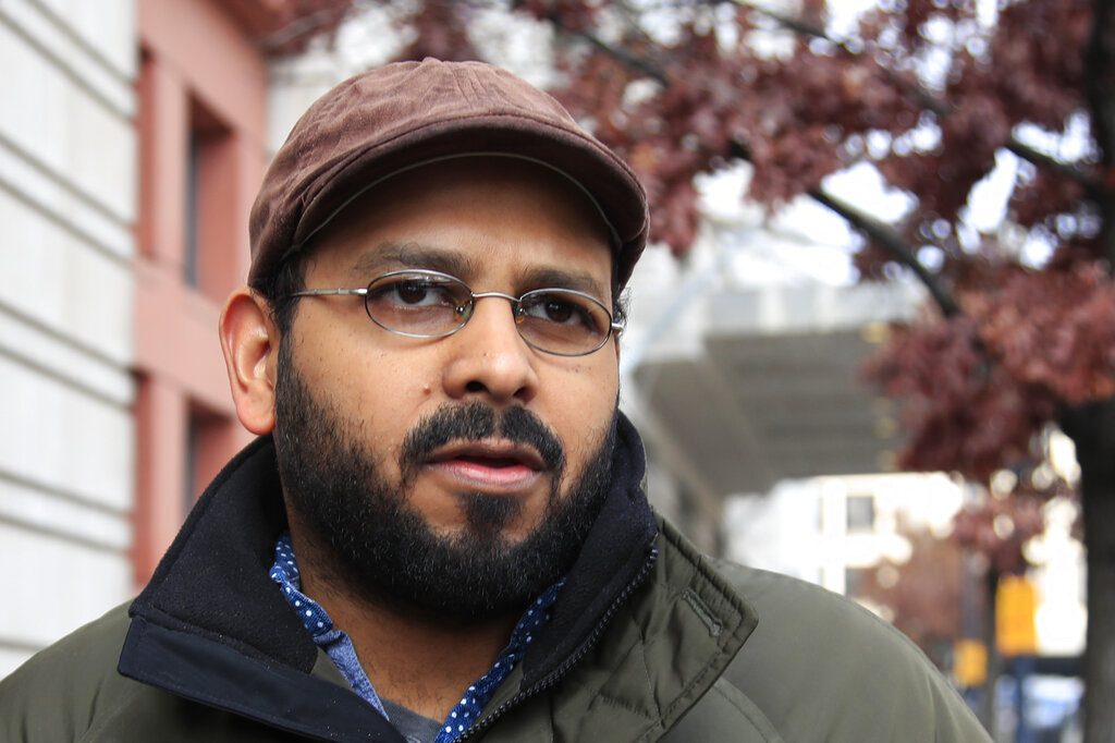 Marizeh Hashemi's son Hossein Hashemi leaves federal court in Washington on Friday.