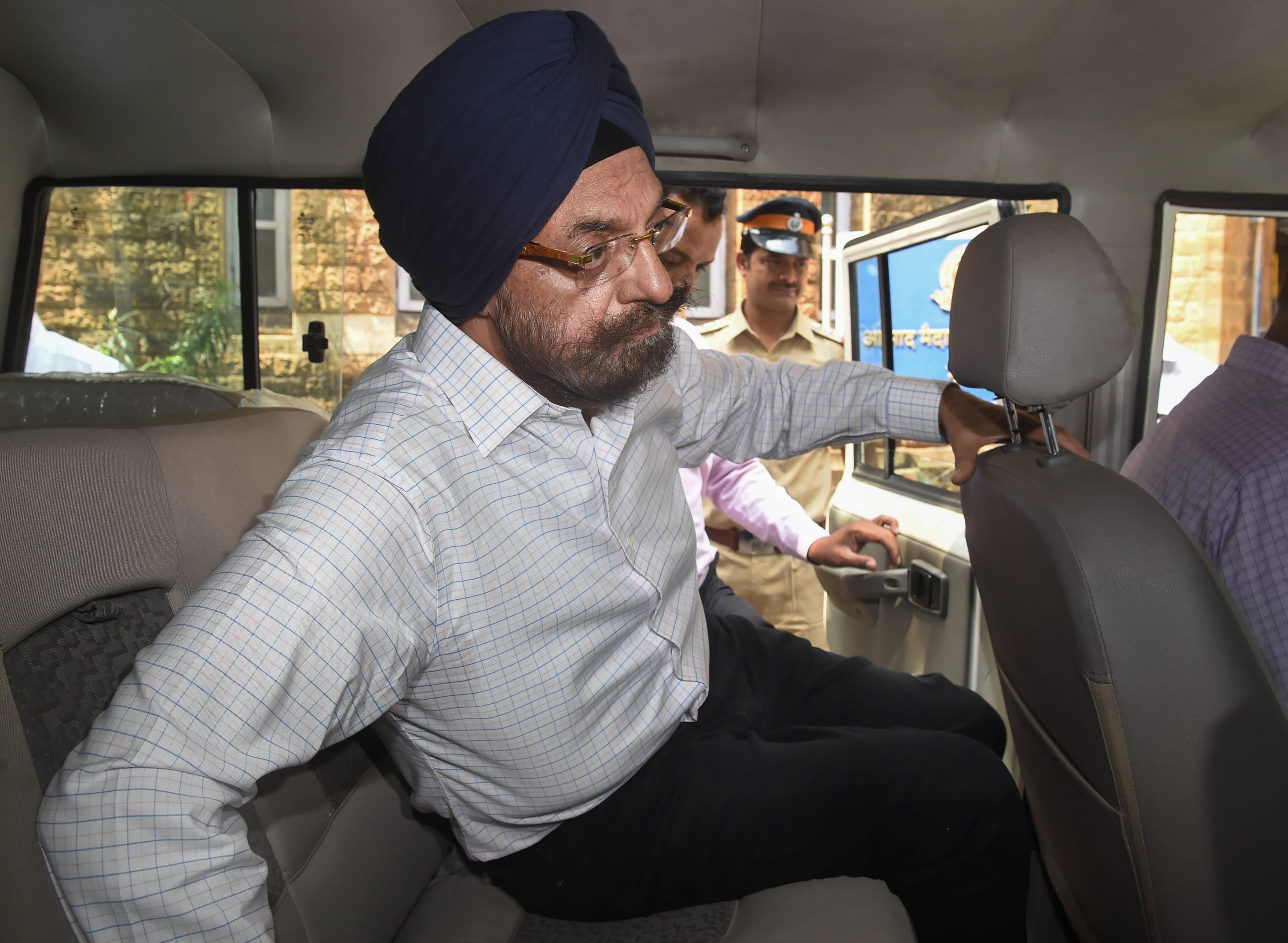 Waryam Singh, former chairman of Punjab and Maharashtra Cooperative (PMC) Bank, arrives a court in connection with the alleged Rs 4,355 crore scam at the bank, in Mumbai, Sunday, October 6, 2019.