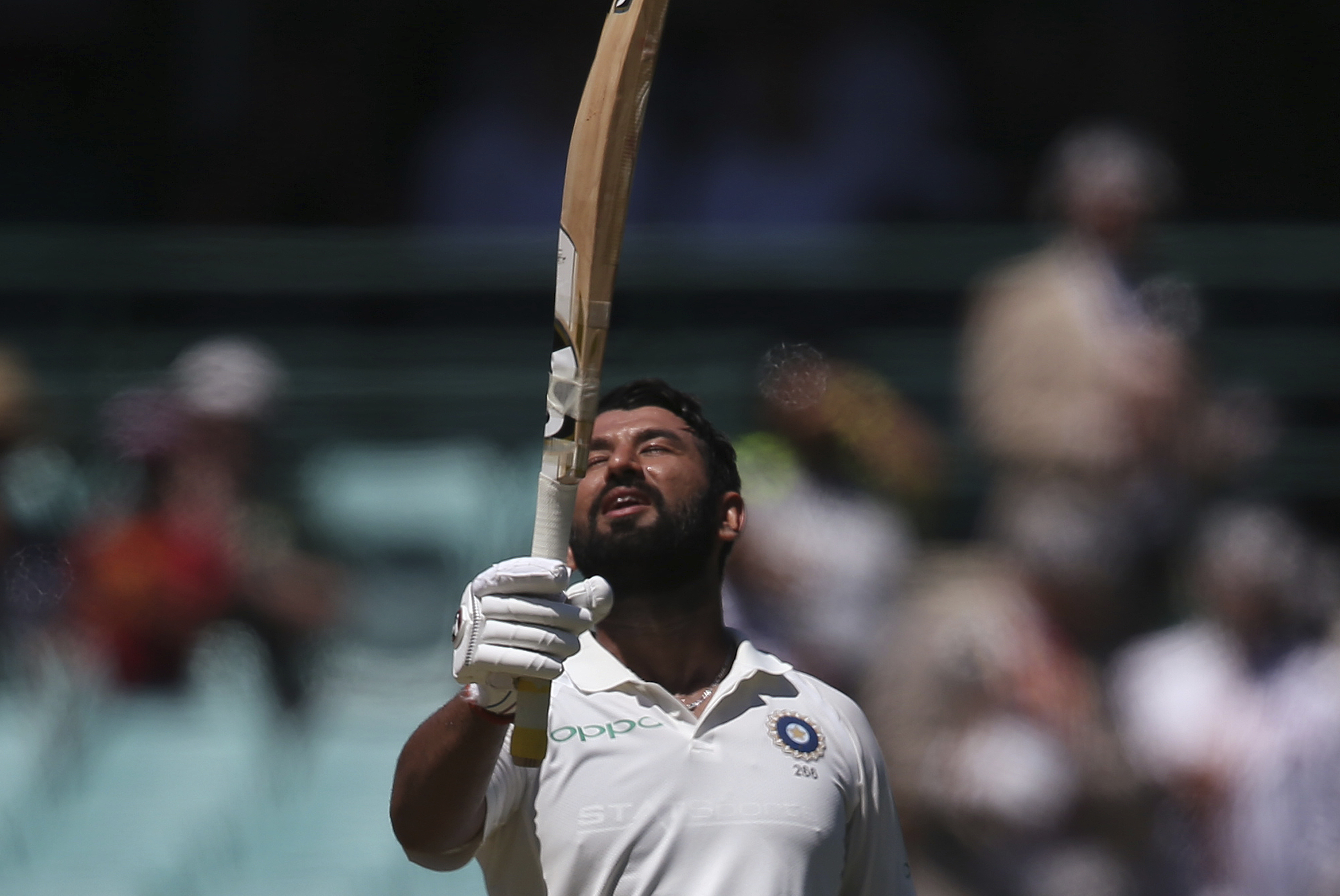 Cheteshwar Pujara celebrates making 150 runs against Australia on day 2 during the cricket test match in Sydney on Friday, January 4. His performance was the crucial variable In the context of the success in Australia
