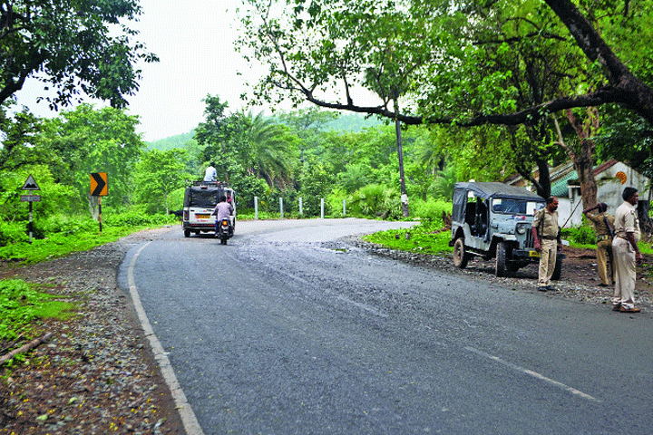 Police inspect the mishap spot at Tiruldih village on Tata-Hata Road in Potka on Monday
