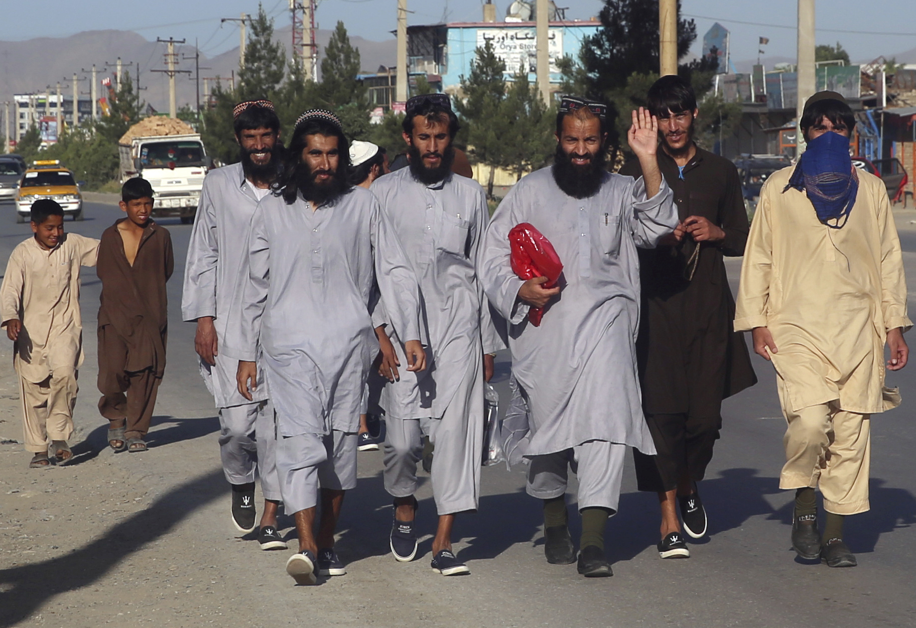 Afghan Taliban prisoners freed from Bagram Prison walk in Kabul