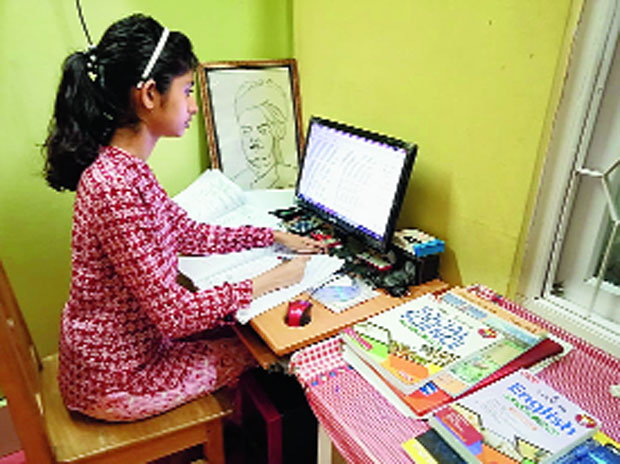 A student takes online classes in Hailakandi.

