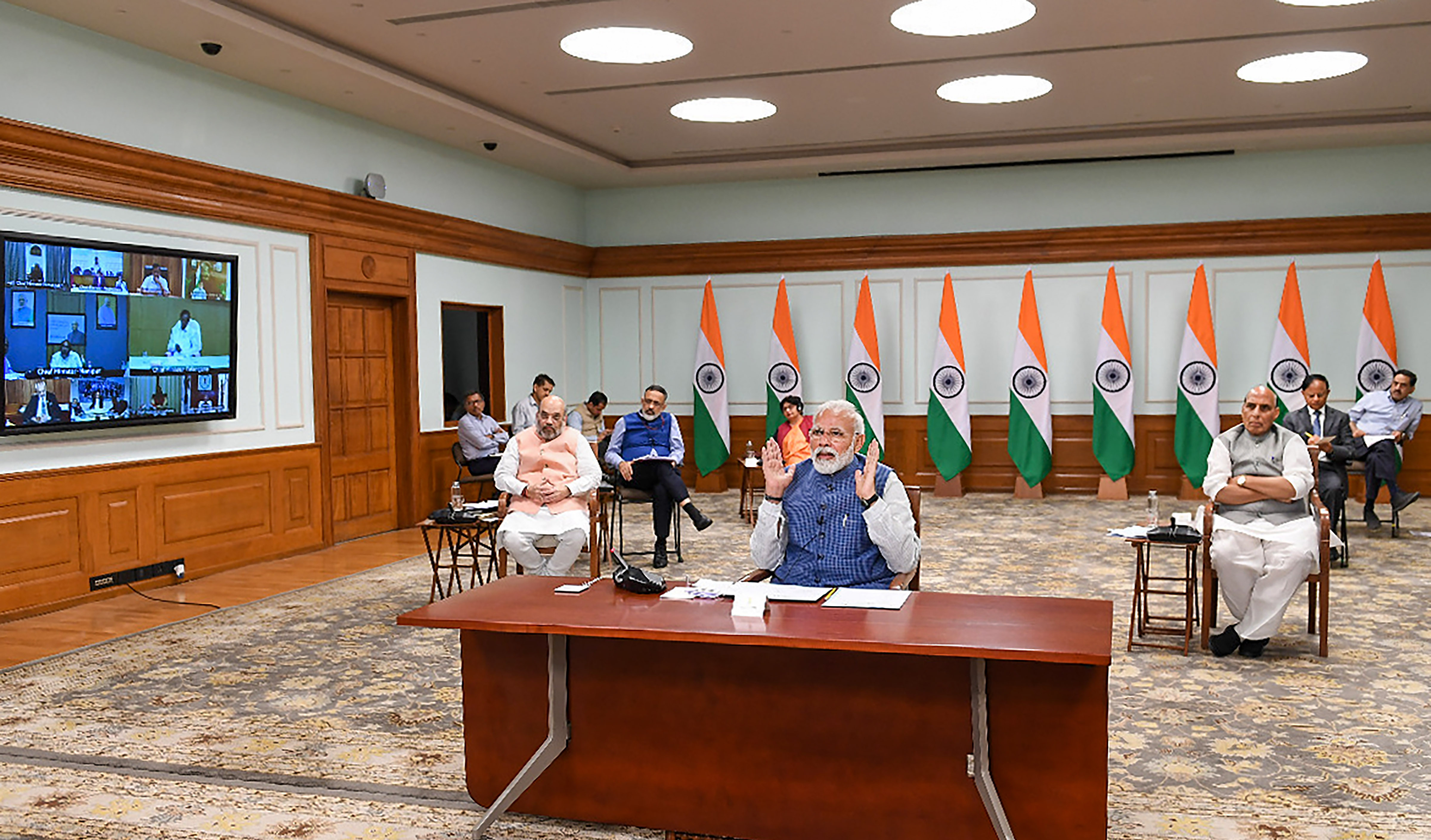 Prime Minister Narendra Modi interacts with all chief ministers to discuss ways to check the spread of coronavirus through a video conference, in New Delhi