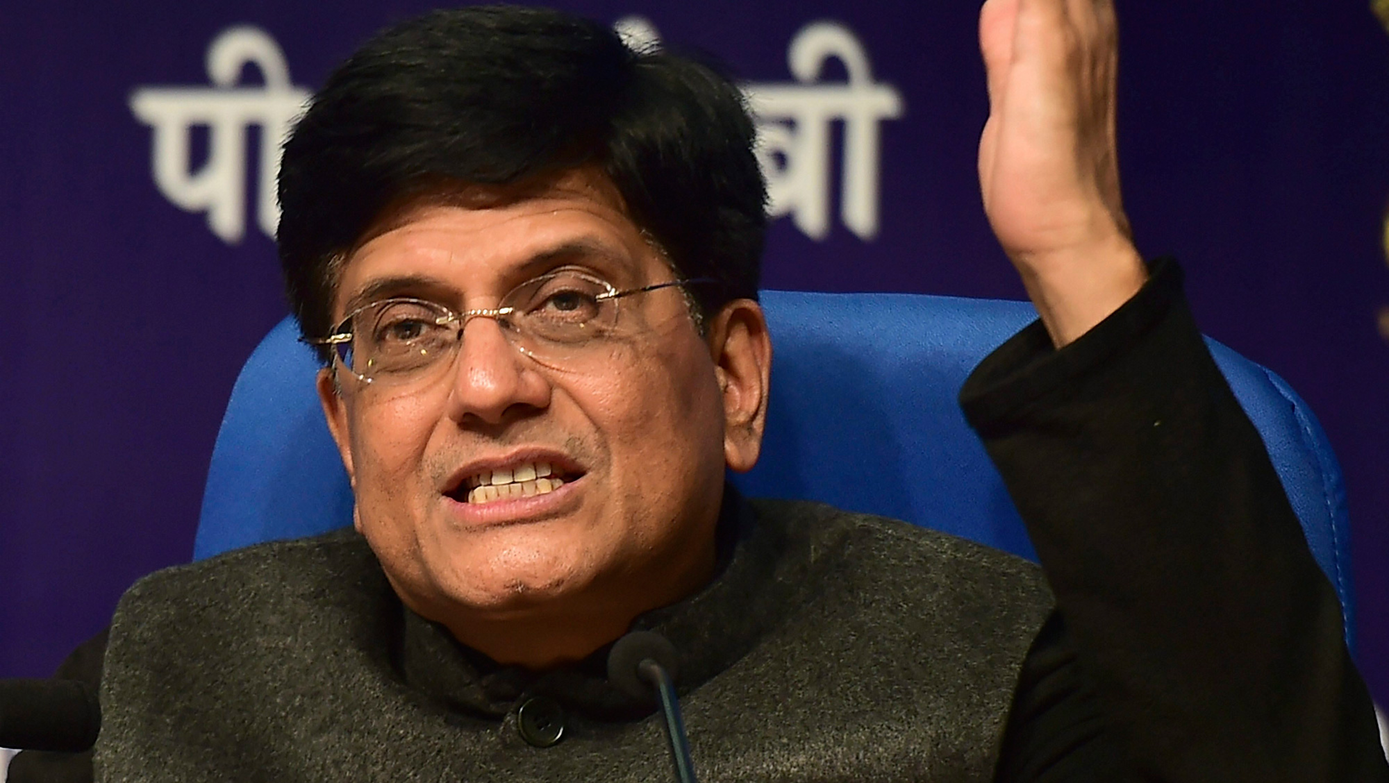 Finance Minister Piyush Goyal gestures during a press conference on interim Budget, in New Delhi on Friday.