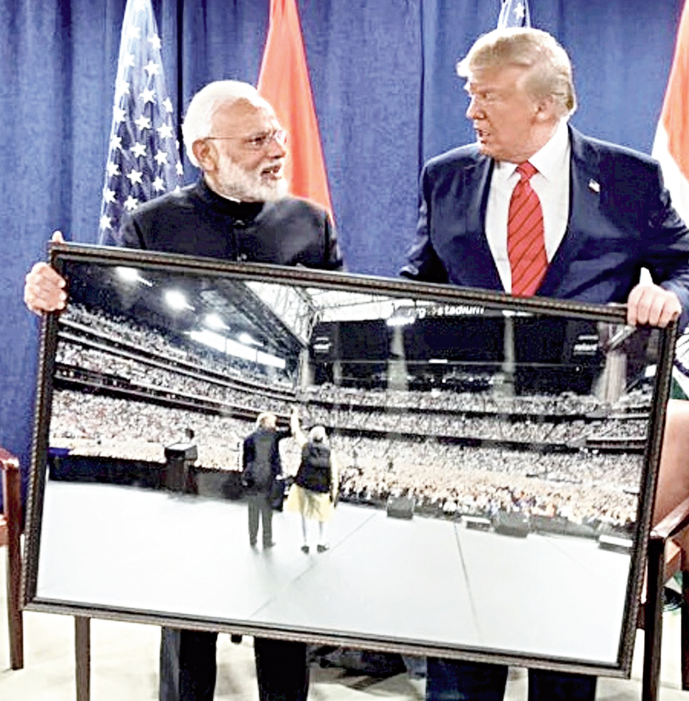Modi presents a framed photograph from the “Howdy Modi” event to Trump in New York on Tuesday. 