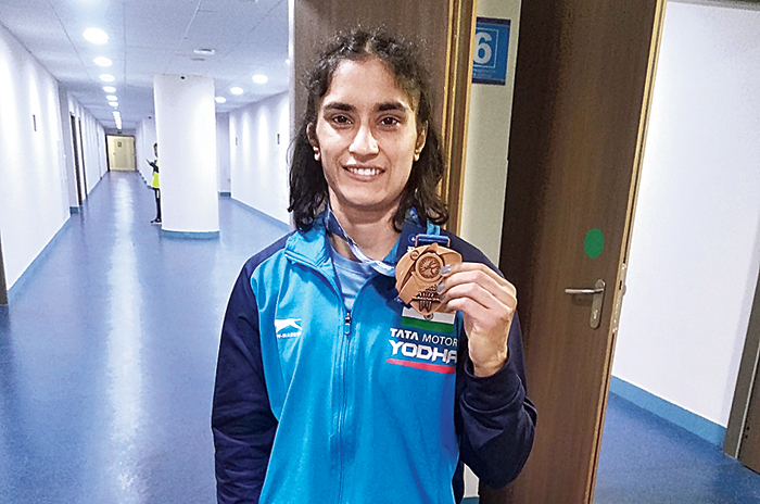 Vinesh with her bronze medal