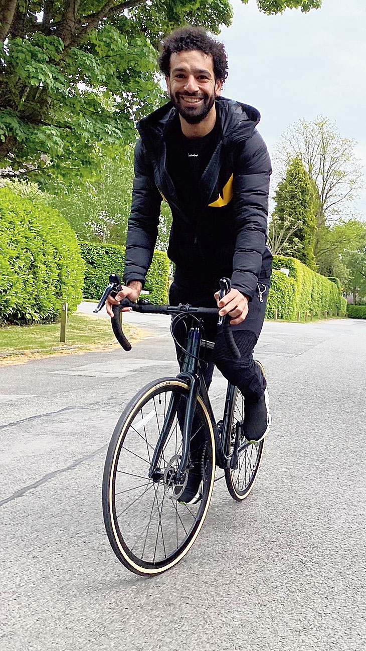 Liverpool’s Egyptian forward Mohamed Salah out on his bicycle on Sunday. 
