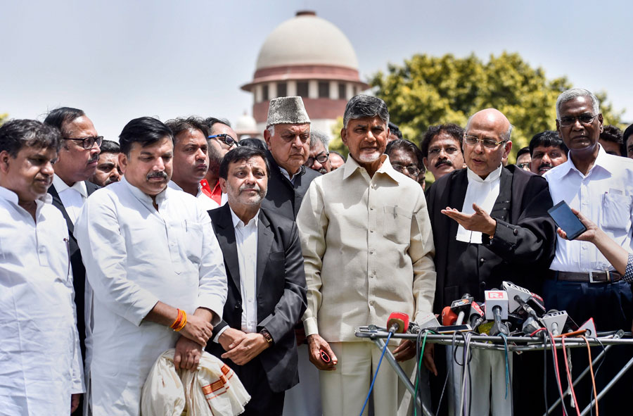Opposition leaders Abhishek Manu Singhvi, N Chandrababu Naidu, Farooq Abdullah, Sanjay Singh and others after Supreme Court hearing, in New Delhi, Tuesday, May 7, 2019.