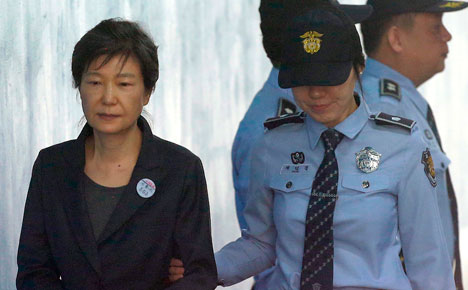 Former South Korean leader Park convicted in corruption case, gets 24 ...