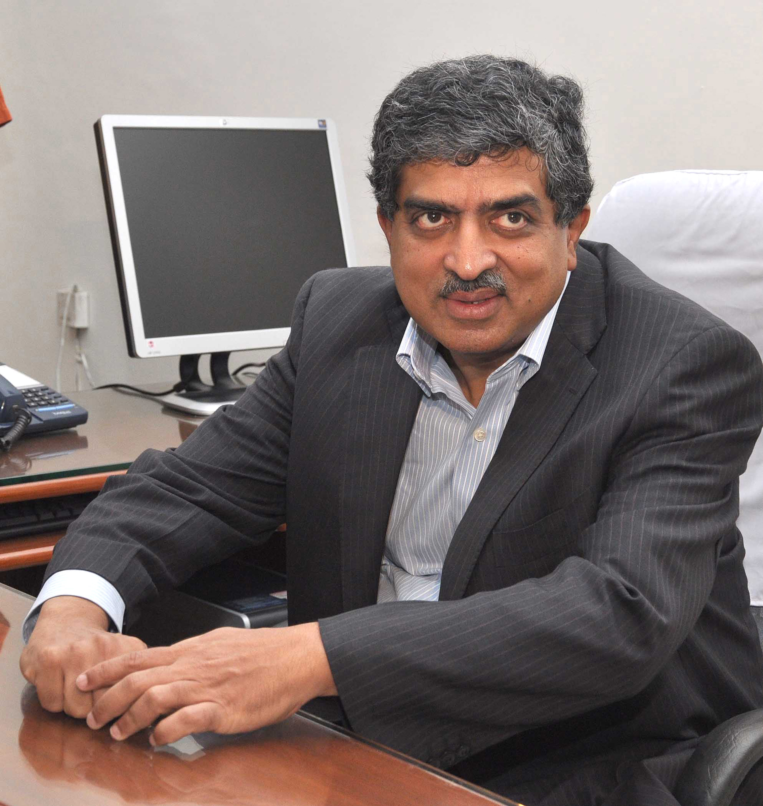 Nilekani vows to be unifier at Infosys - Telegraph India