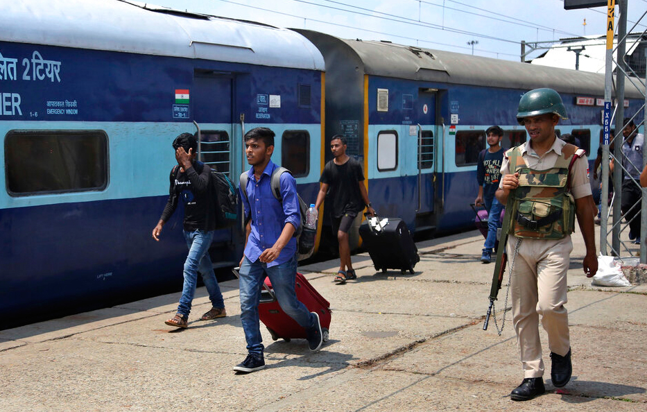 National Institute of Technology students who left Srinagar, Kashmir's main city arrive to board a train to leave for their respective homes from a railway station in Jammu on Sunday, August 4, 2019.