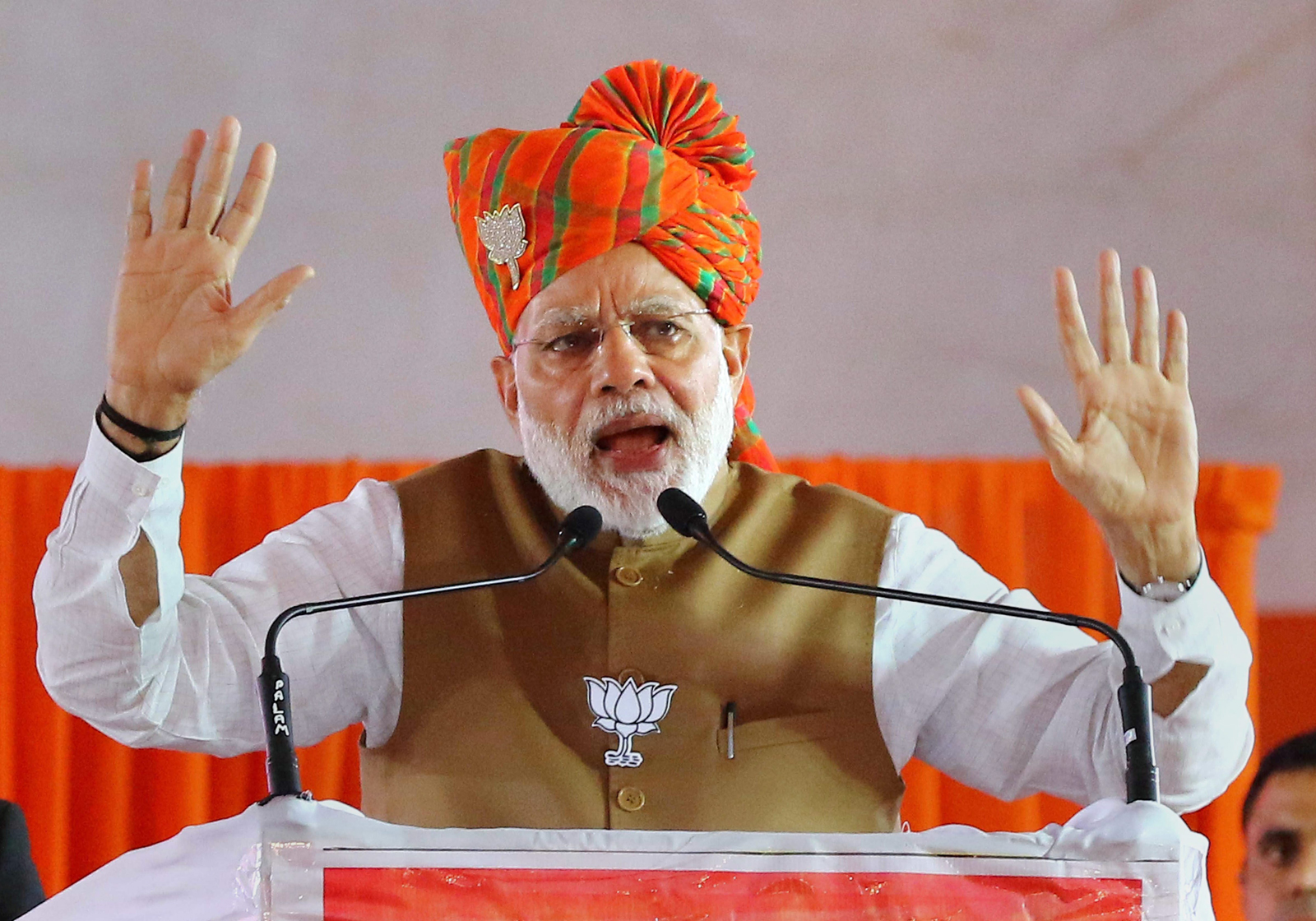  Narendra Modi addresses a rally ahead of the Rajasthan Assembly elections in Jaipur on Tuesday.