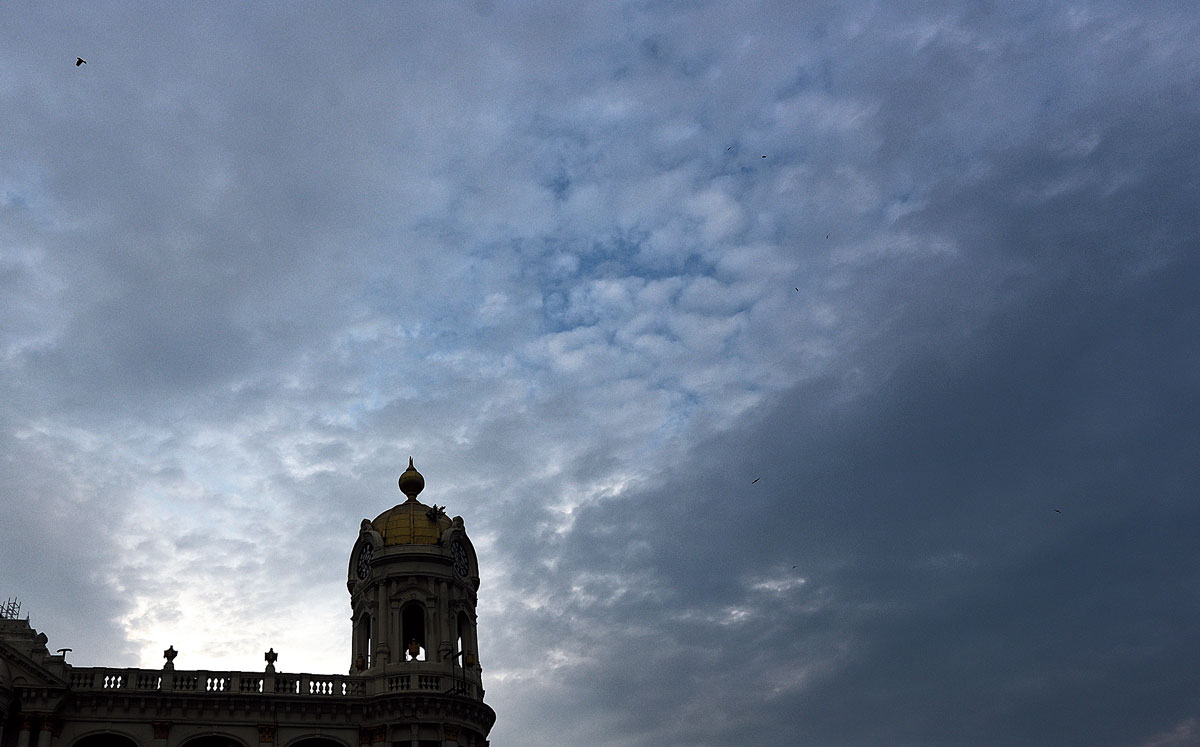 Sun peeps through a thin veil of cloud over Calcutta on Thursday afternoon.