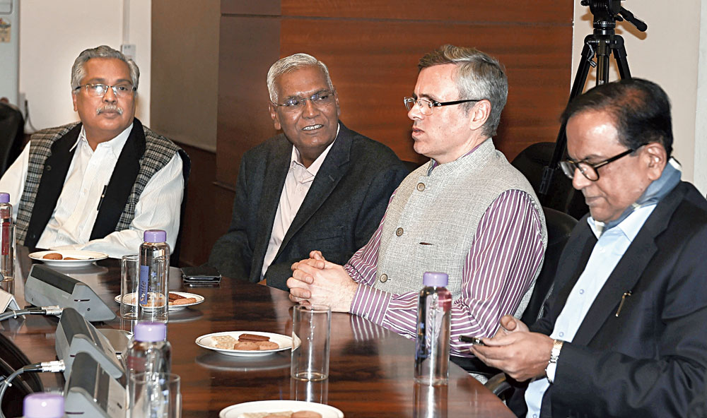 (From left) The CPI’s D Raja, the National Conference’s Omar Abdullah and the BSP’s SC Misra at an all-party meeting in New Delhi on Tuesday.