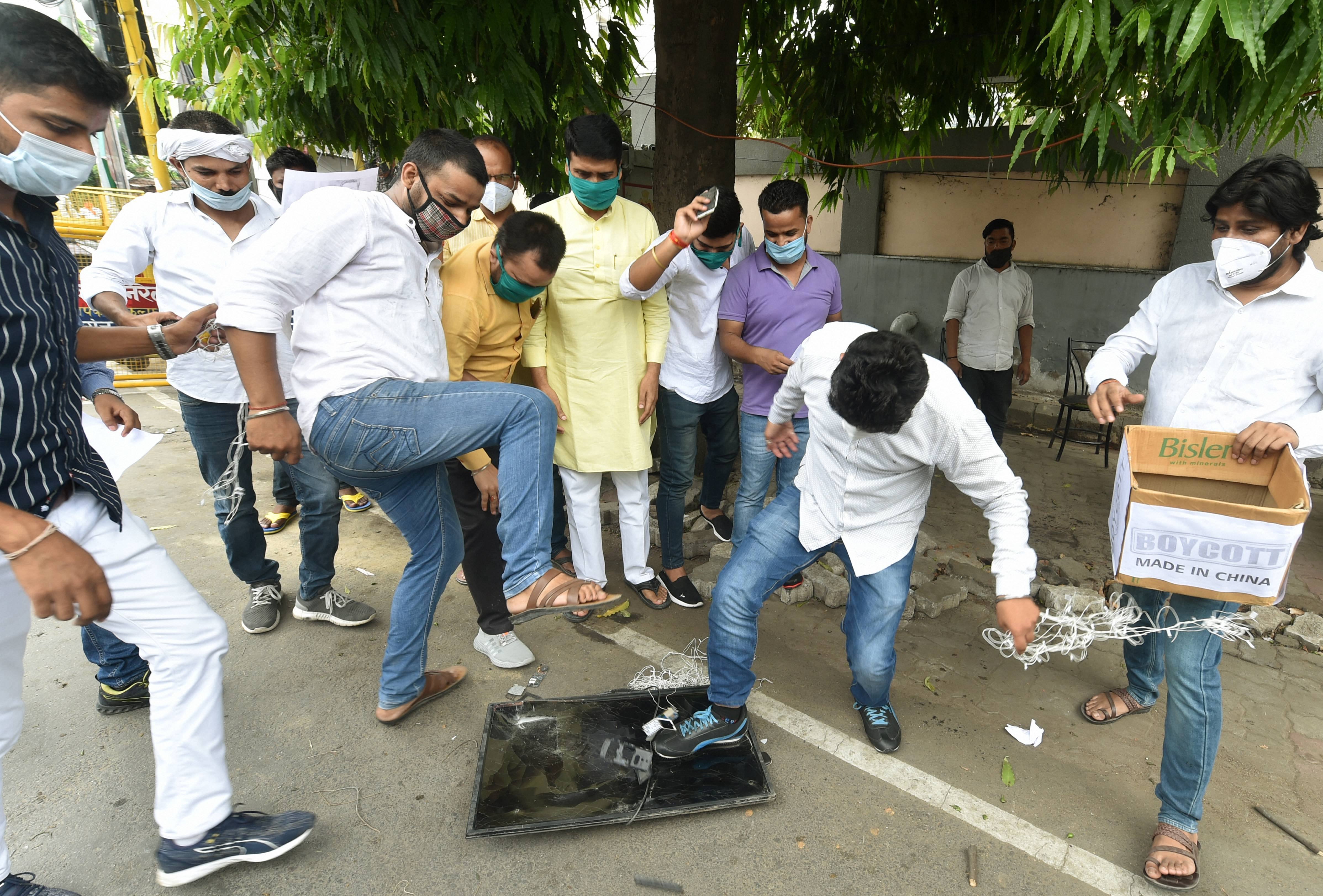 Congress MLC Deepak Singh (C) along with party supporters during a protest against the killing of 20 Indian Army soldiers in Ladakhs Galwan Valley by the Chinese Peoples Liberation Army (PLA) troops, in Lucknow, Thursday, June 18, 2020.