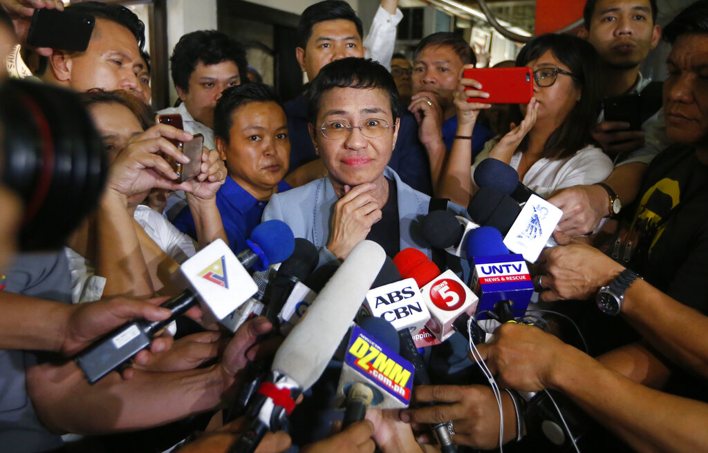 Maria Ressa listens to a reporter's question after posting bail at a Regional Trial Court in Manila on Thursday. 