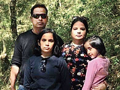 An undated picture of Vivek Tiwari with his family
