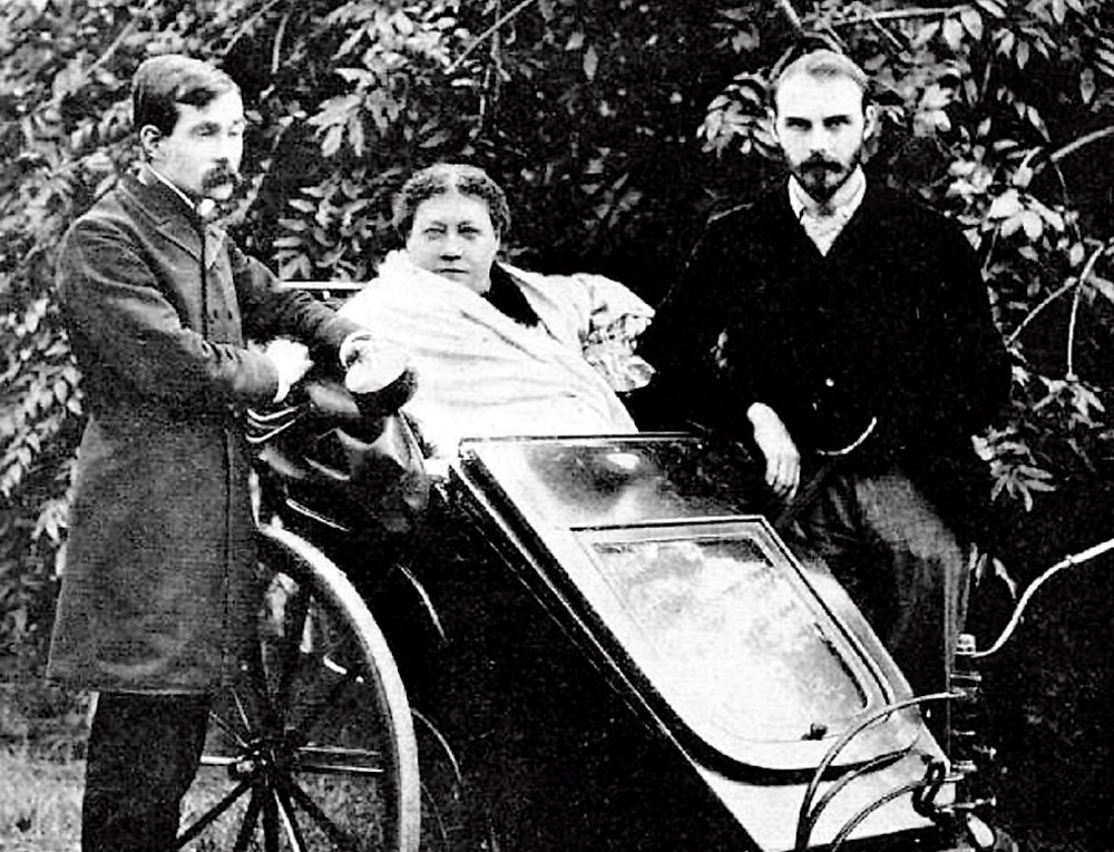 Helena Petrovna Blavatsky (seated), with James Morgan Pryse and George Robert Stow Mead in London 1890