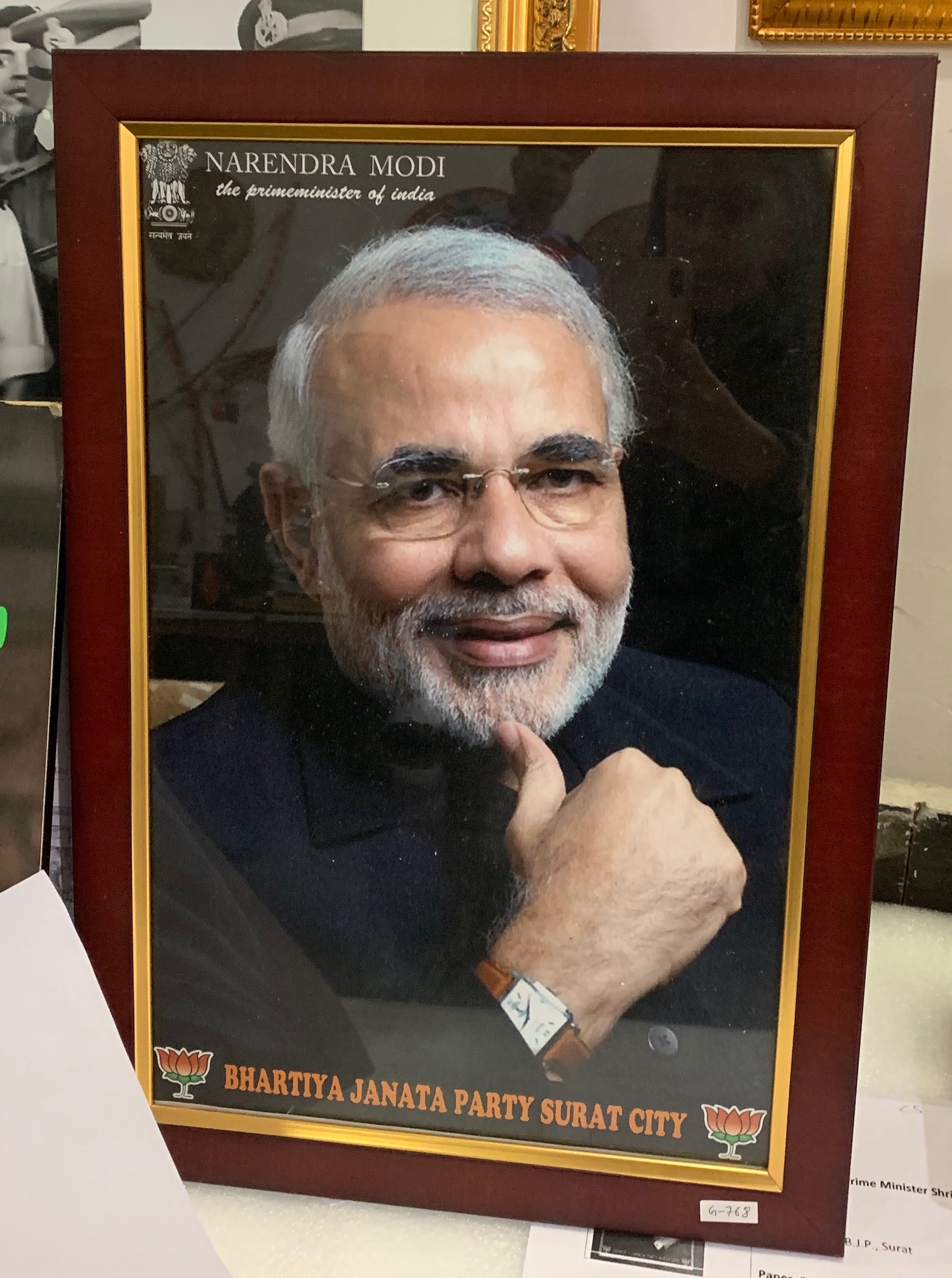 A photograph of Narendra Modi with a winning bid of Rs 3800