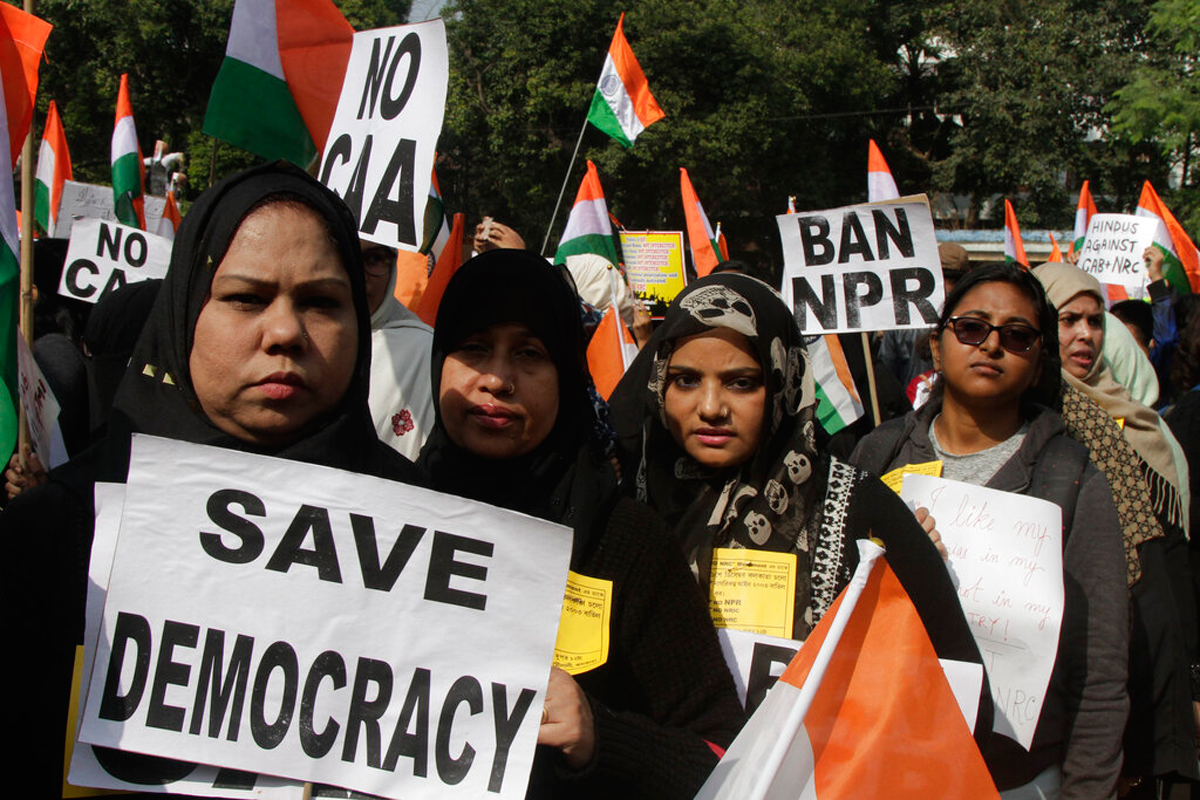 Protesters walk in a rally demanding the withdrawal of the Citizenship Amendment Act and National Register of Citizens in Calcutta.
