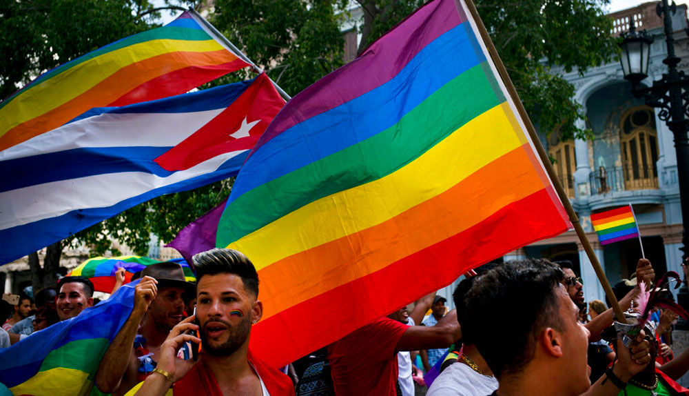 Gay rights activists take part in an unauthorised march in Havana, Cuba, on Saturday