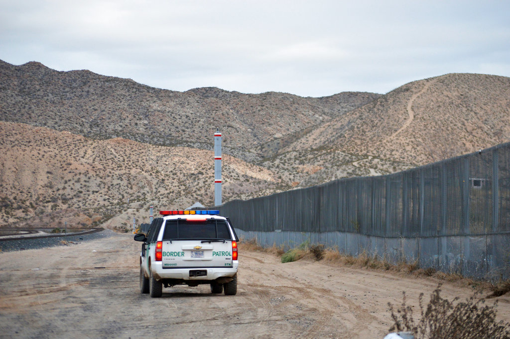 In this January 4, 2016, file photo, a US Border Patrol agent patrols Sunland Park along the US-Mexico border. 