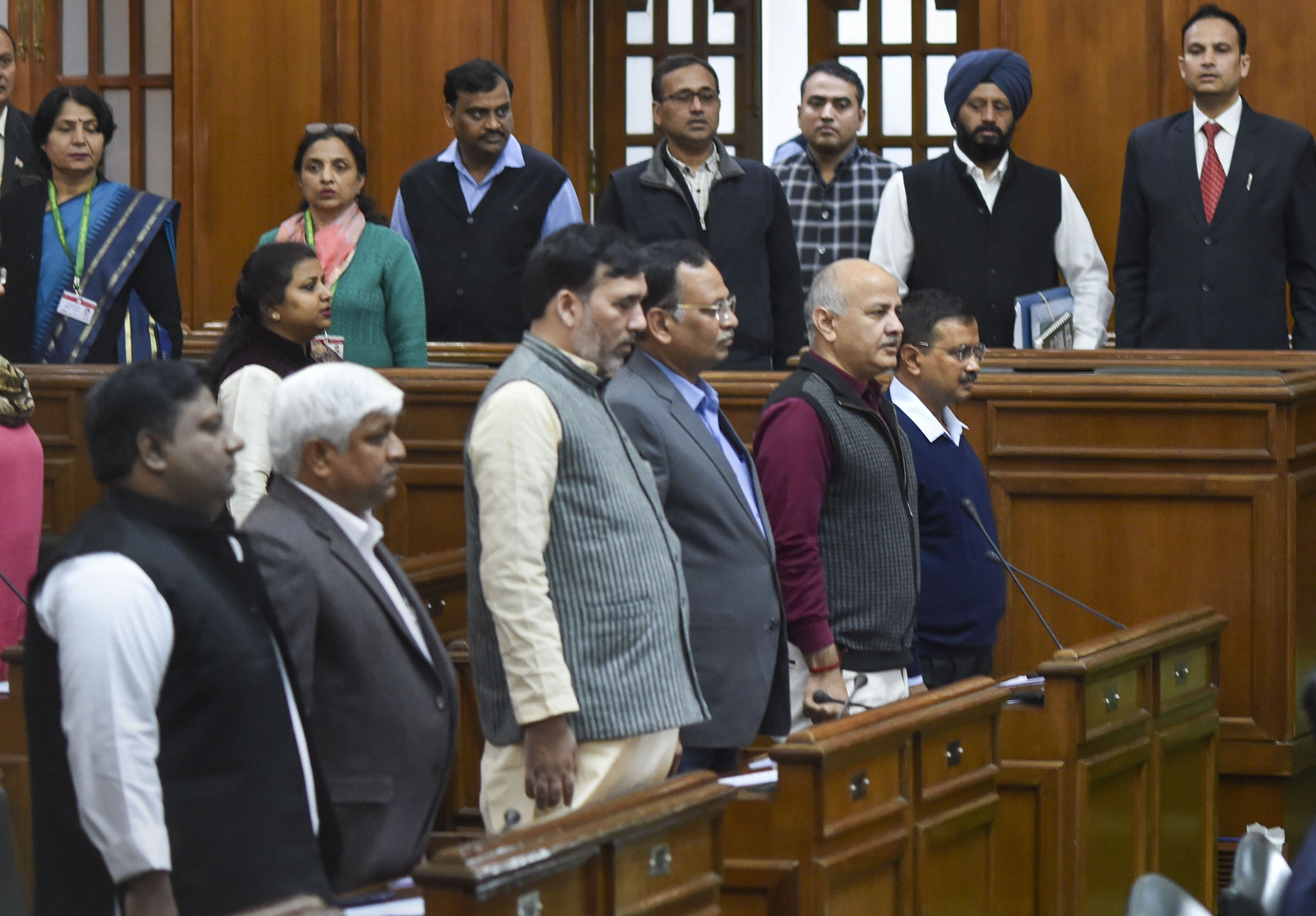 manish-sisodia-kejriwal-sisodia-take-oath-as-members-of-delhi