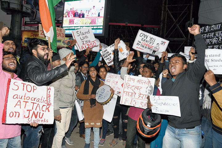 Students at Albert Ekka Chowk in Ranchi on Monday protest against the violence on JNU campus. 