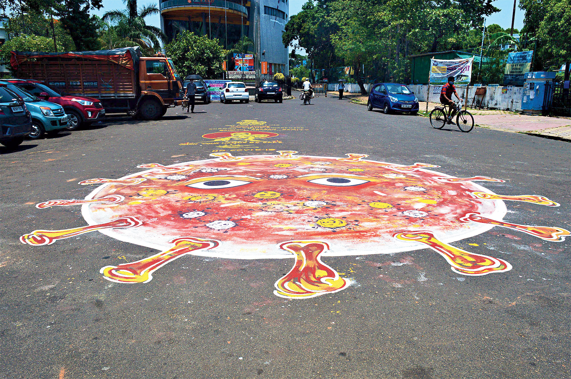 A road near Baisakhi Abasan painted with awareness messages
