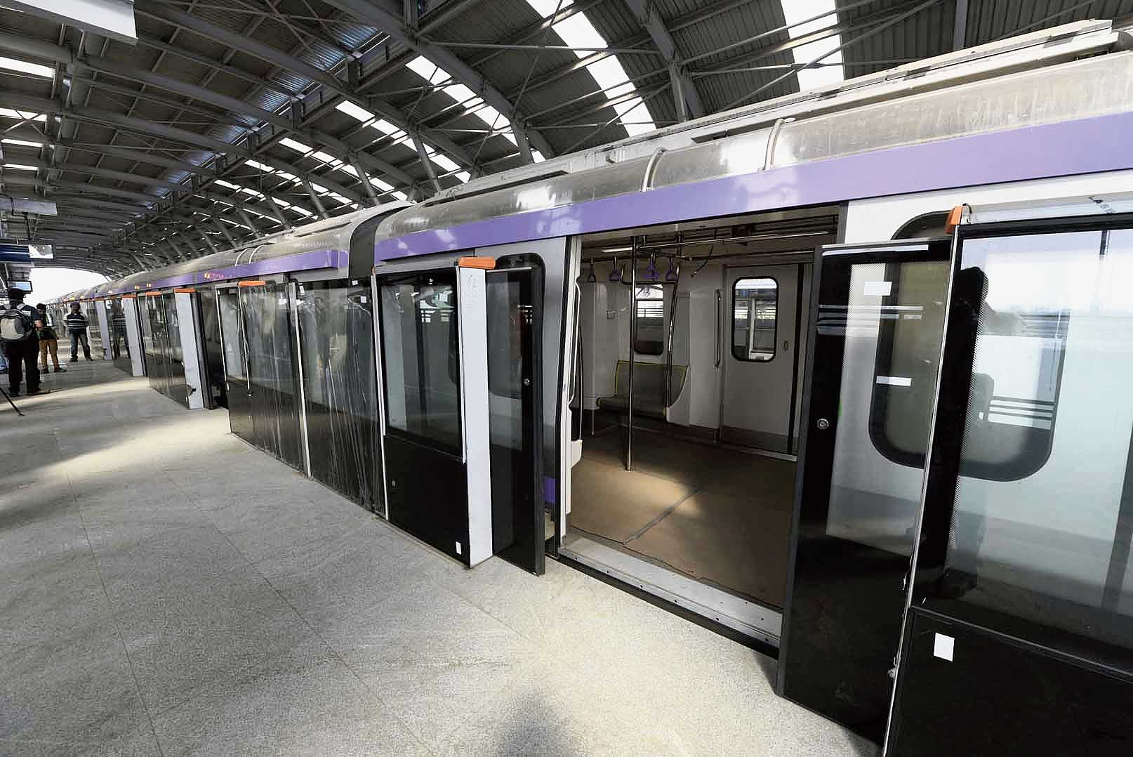 All the platform screens, meant to act as a safety barrier, and the train doors open in synchronisation. 