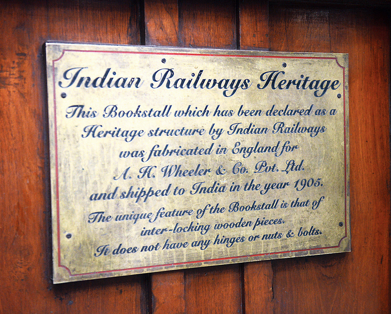 A plaque narrating the history of the 113-year-old wooden bookstall at Howrah station.