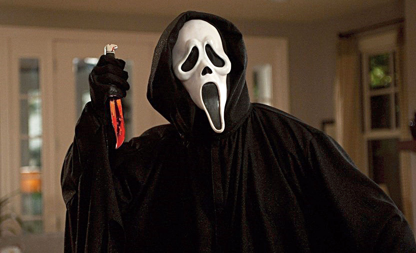 Scream (1996)
In the late ’90s, Wes Craven made a whodunit-style mystery with every slasher cliché in the book, but it worked. And how! Starring Neve Campbell, David Arquette, Rose McGowan, and Drew Barrymore as teenagers with Courtney Cox as news reporter Gale Weathers, Scream was funny and scary at the same time — a difficult balance to successfully achieve. It eventually spawned three sequels and a TV spin-off. Enough said.