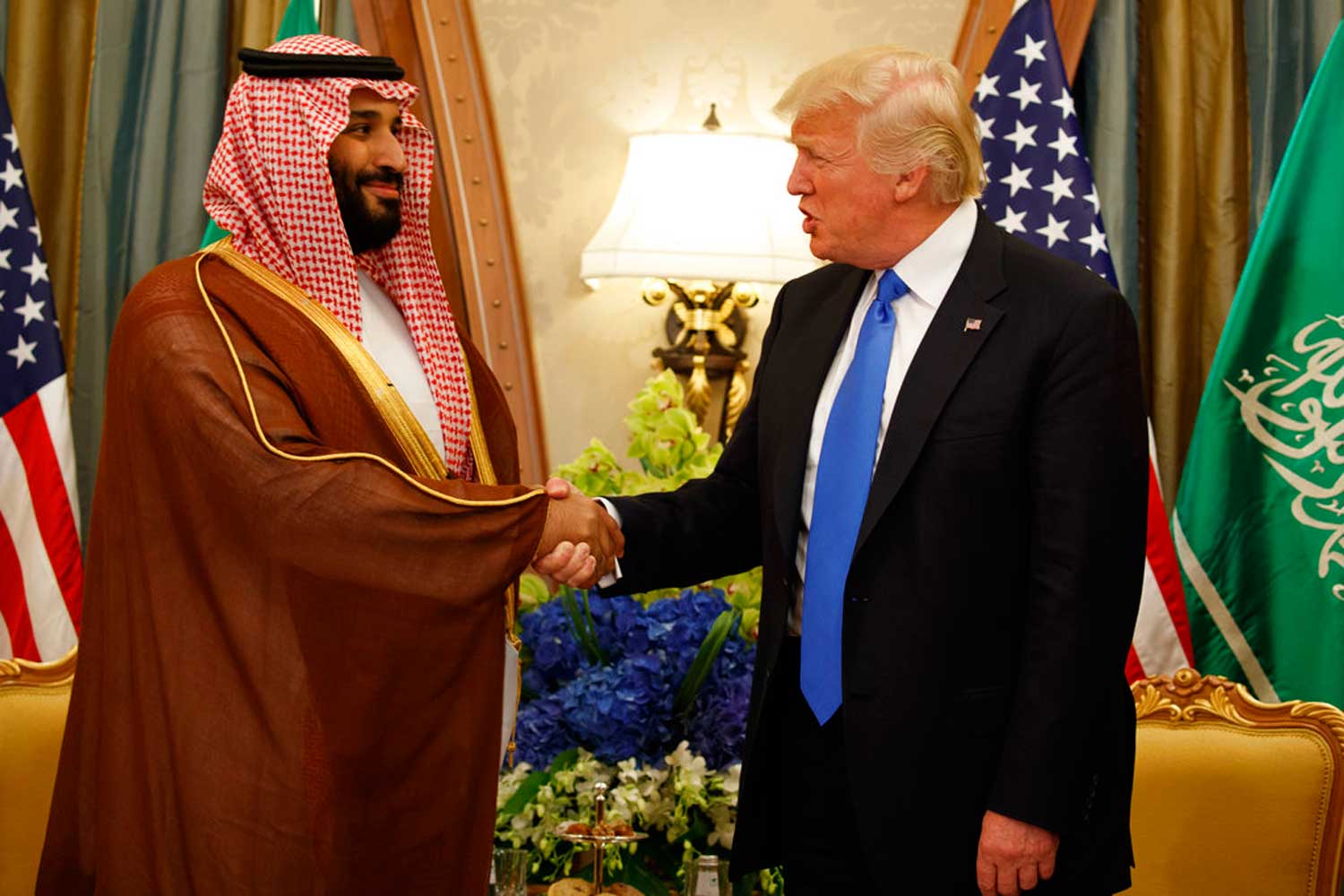 President Donald Trump shakes hands with Saudi Crown Prince Mohammed bin Salman, in Riyadh, Saudi Arabia on May 20, 2017.