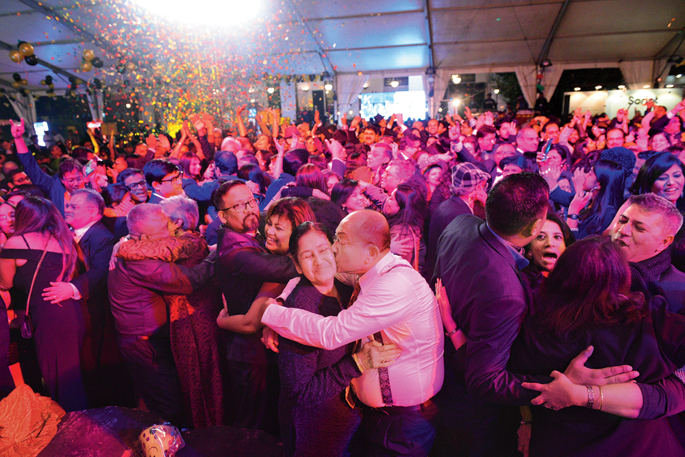 Midnight moment: Hugs and kisses spread across a packed dance floor as Krosswindz ushered in the New Year with a rendition of ‘The Ketchup Song’. A burst of confetti engulfed revellers in a multitude of colours as the band then started a rendition of ‘Auld Lang Syne’, sharp at midnight