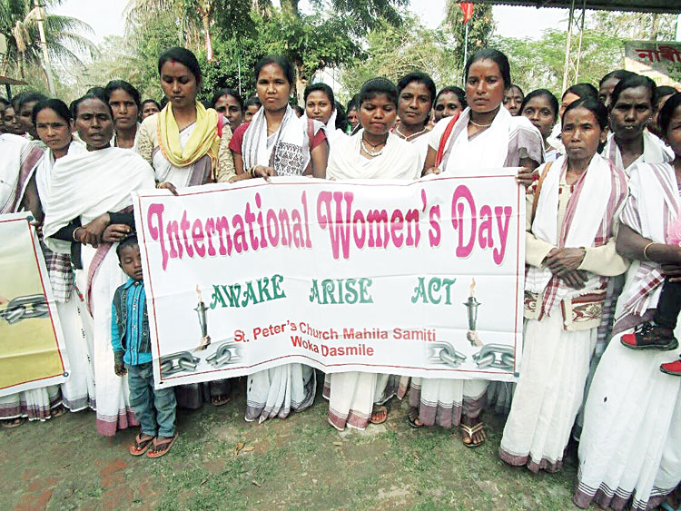 Women participate in the rally on Friday