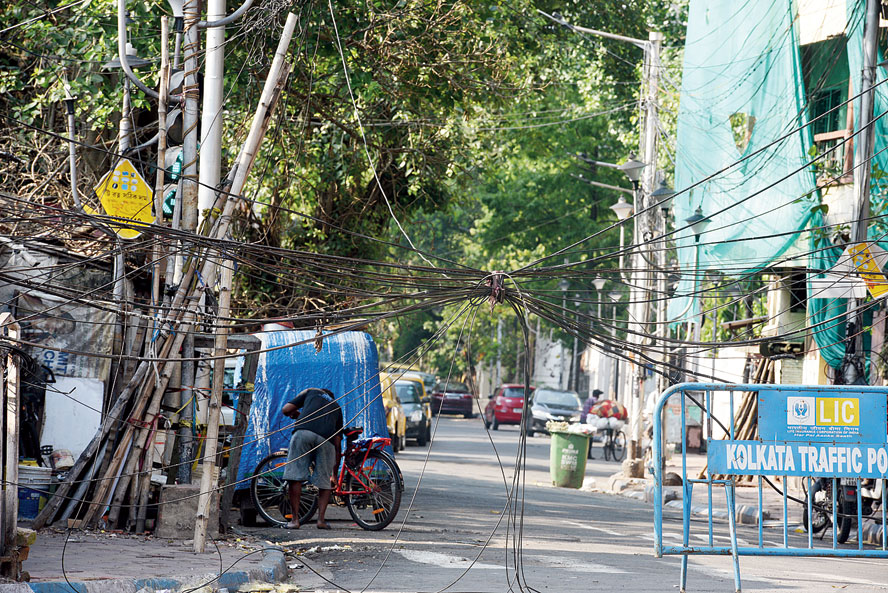 Snapped cables were seen tied together over Dover Road on Wednesday