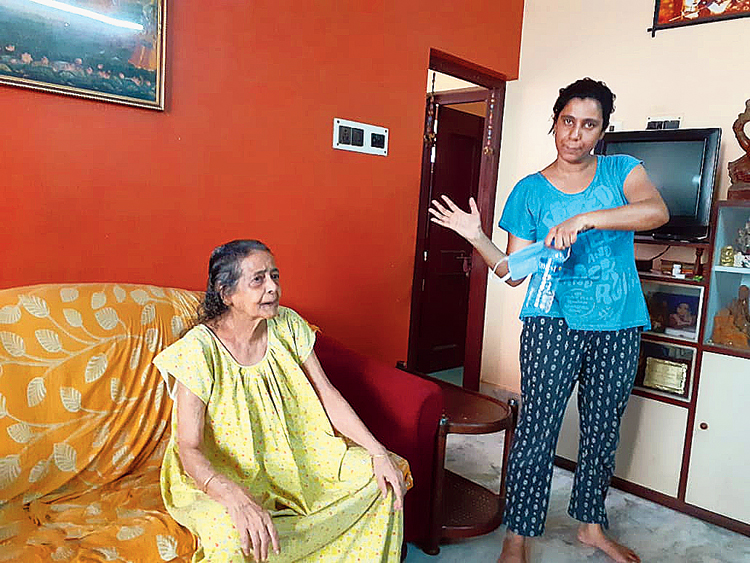 Rita Goswami (left) with her granddaughter Vijaylakshmi Dubey. The wires landed on the Dubeys’ verandah. Vijaylakshmi and her sister Anushka had to bodily lift their grandmother, Rita Goswami, 81, and shift her to a relative’s home close by as they feared that their house would be electrified because of the invading wires