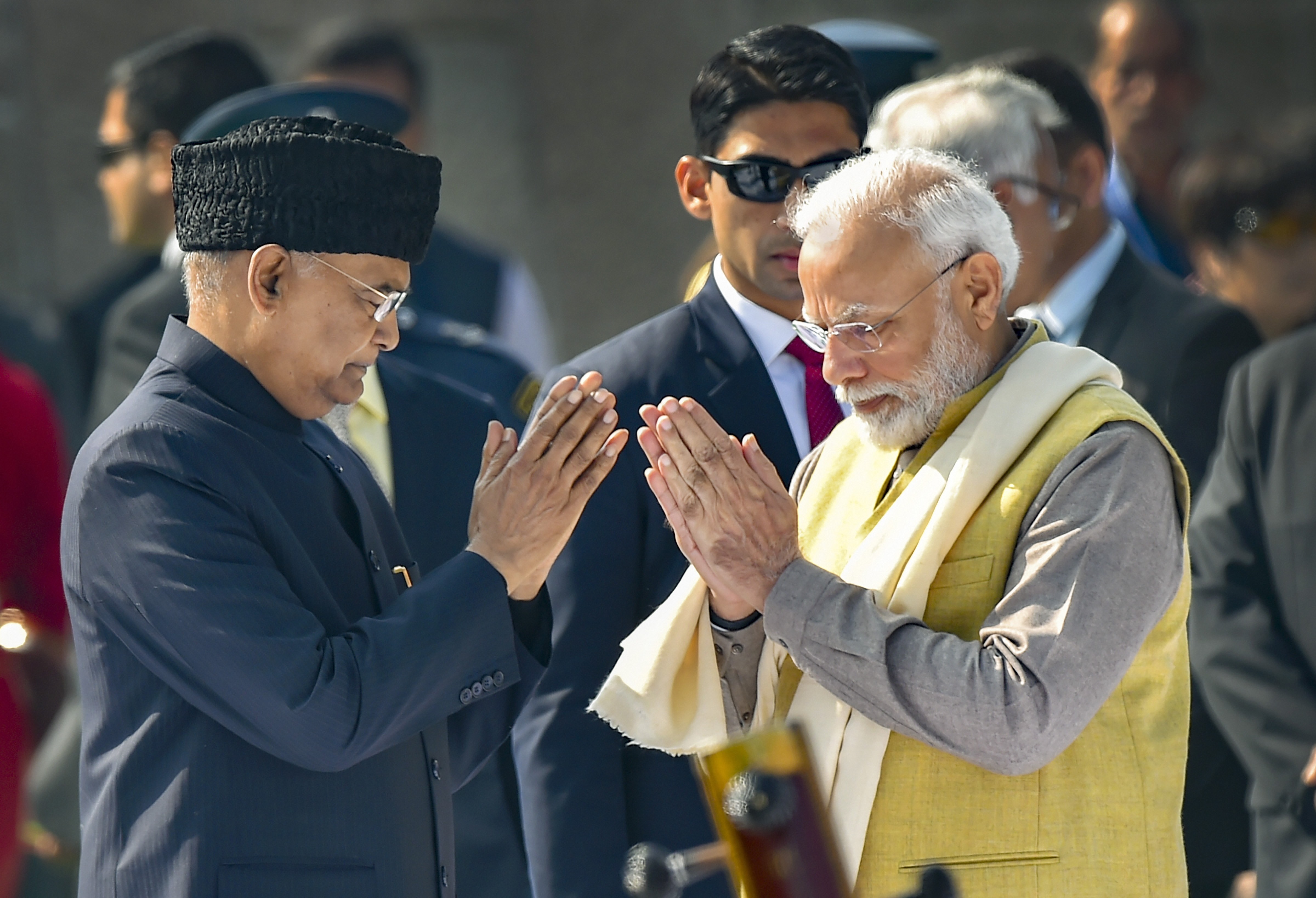President Ram Nath Kovind is greeted by Prime Minister Narendra Modi during a tribute paying ceremony on the 72nd death anniversary of Mahatma Gandhi, also observed as Martyrs Day, at Rajghat
