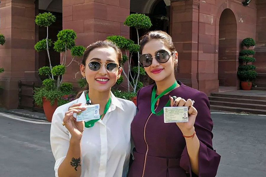 Newly-elected TMC MPs Mimi Chakraborty and Nusrat Jahan pose for photographs at Parliament House in New Delhi on Monday, May 27, 2019.