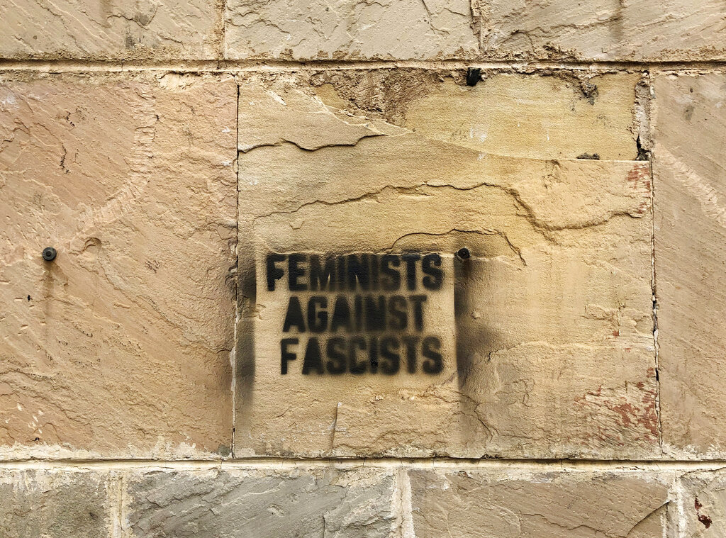 Graffiti in Jamia Millia Islamia that reads, "Feminists against Fascists," spray-painted in the university