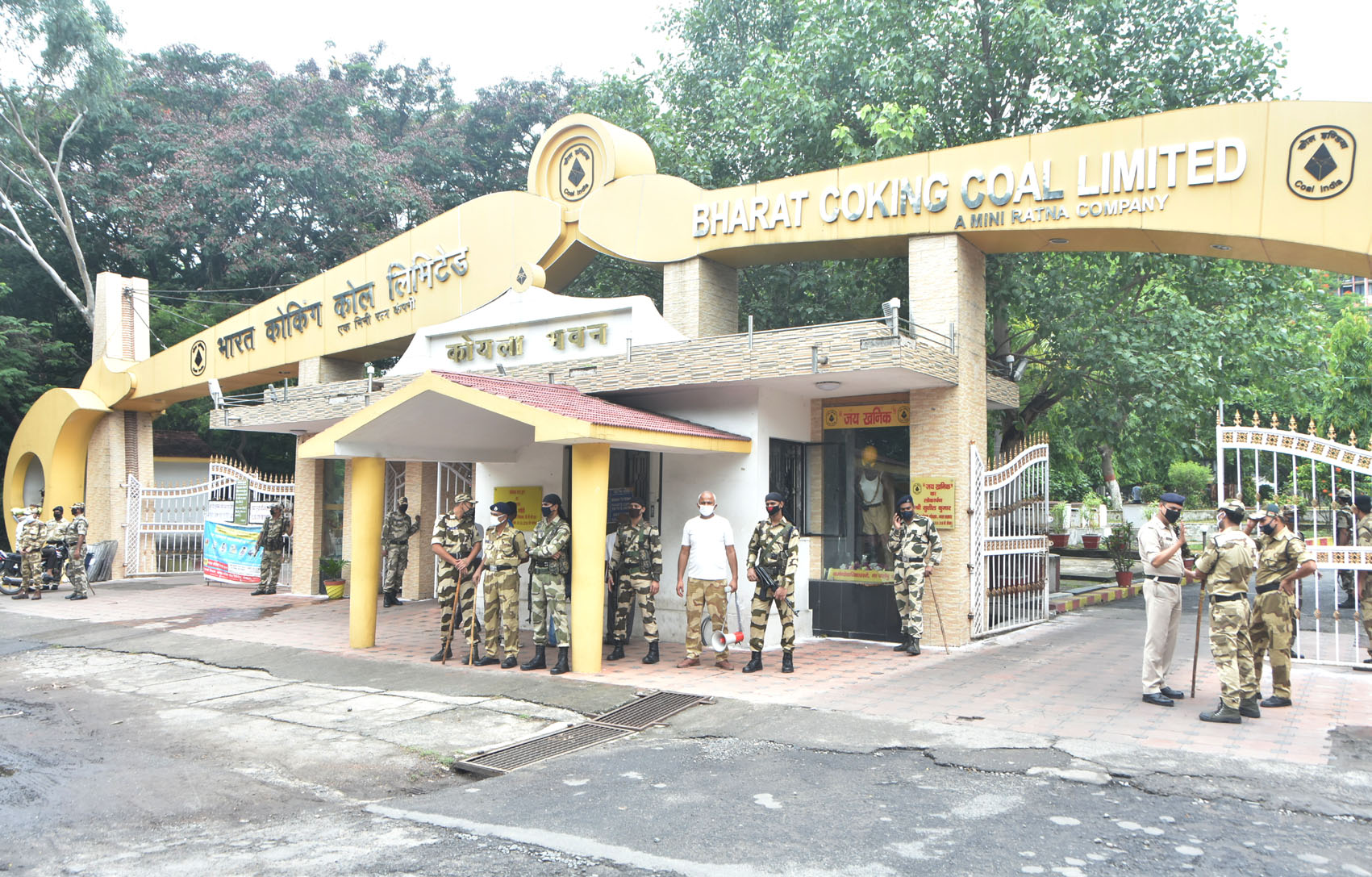 CISF jawans on guard at the main gate of Koyla Bhavan, the BCCL headquarters in Dhanbad, on Thursday. The day saw several demonstrations against the Centre’s decision to allow coal mining for commercial purposes