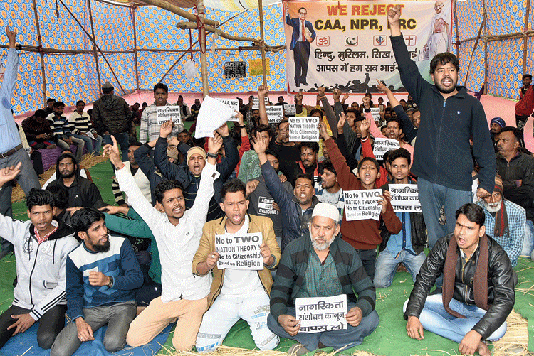 A sit-in against the CAA, NRC and NPR in Dhanbad on Wednesday.