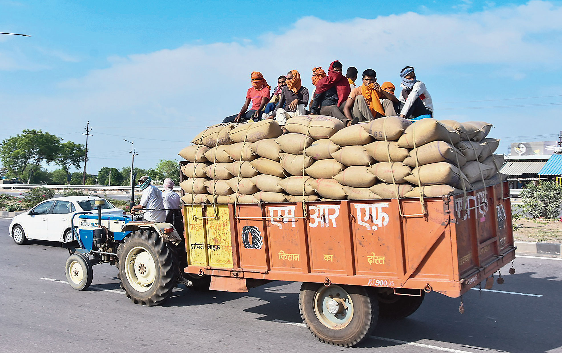 Migrants in a loaded trailer in Mathura, Uttar Pradesh, on Tuesday.