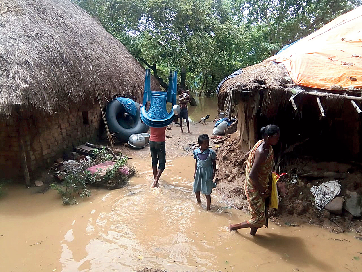Misery: Condition of flood-hit victims at a village in Balasore district.