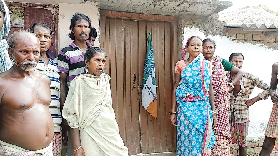 A Trinamul flag on the door of a booth committee president’s house in Birbhum’s Illambazar. Villagers had hung the flag demanding refund of cuts.