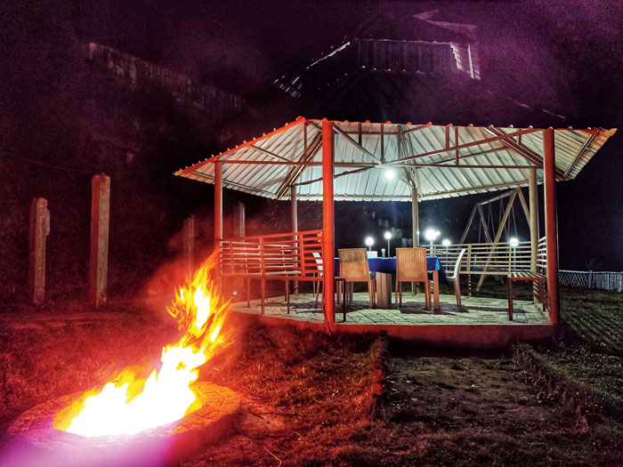 Ask for your dinner to be served at this outdoor area, while you warm yourself up around the bonfire