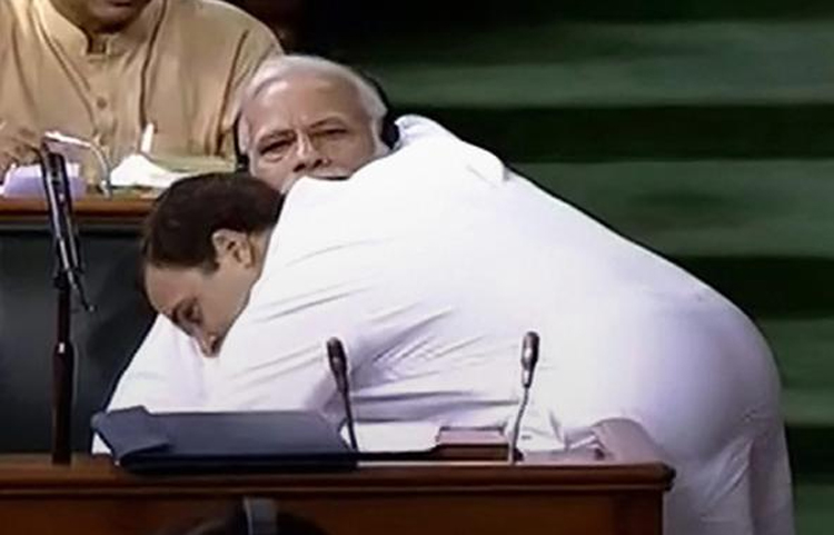 Congress President Rahul Gandhi hugs Prime Minister Modi after his speech during the debate on the no-confidence motion against the government in the Lok Sabha in July 2018.